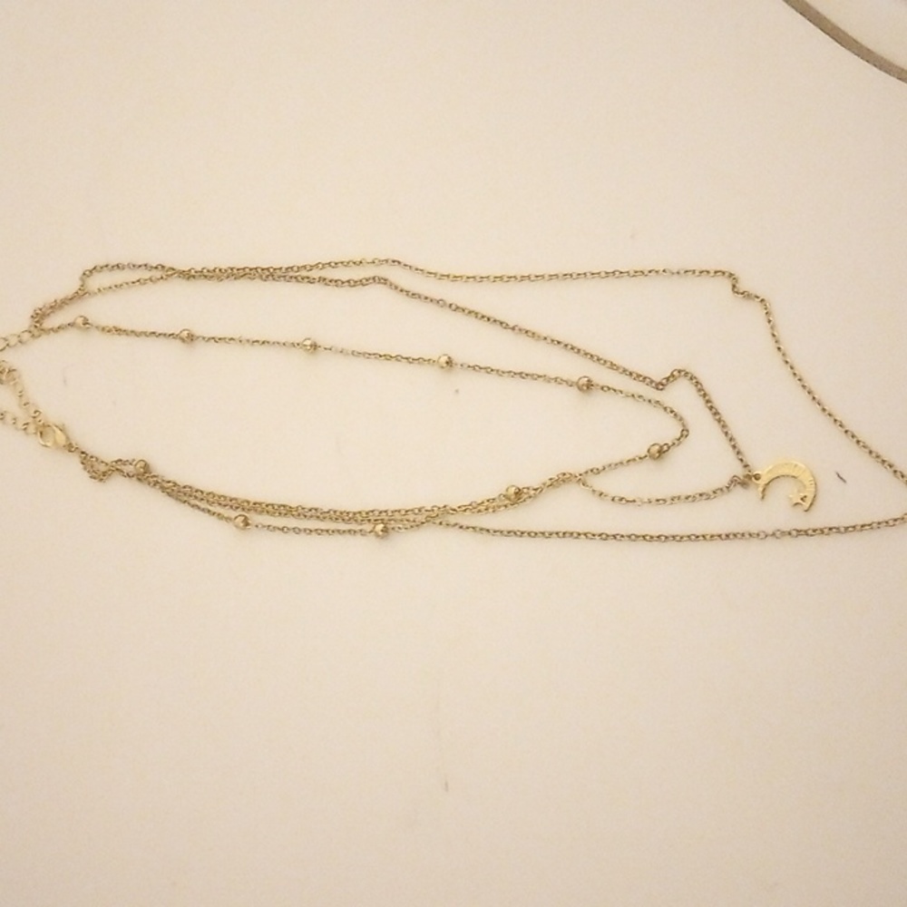 Gold three on one necklace Claire's